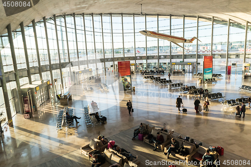 Image of People waiting for their flight at departure terminal of Valencia Airport in Manises, also known as Manises Airport