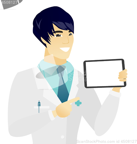 Image of Young asian doctor holding tablet computer.