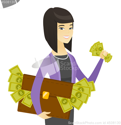 Image of Asian business woman with briefcase full of money.