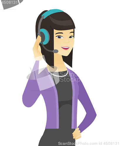 Image of Asian customer service operator in headset.