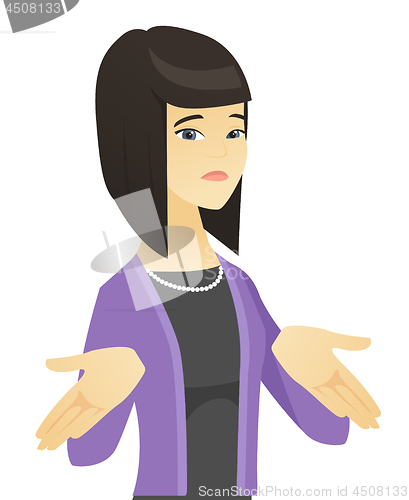 Image of Confused asian business woman shrugging shoulders.