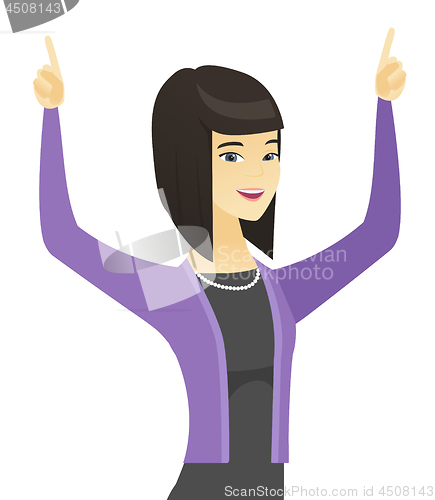 Image of Asian business woman standing with raised arms up.