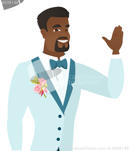 Image of Young african-american groom waving his hand.