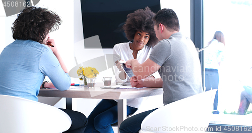 Image of Multiethnic startup business team on meeting
