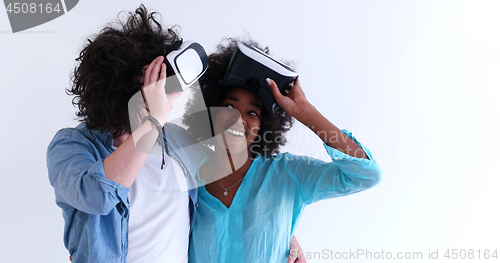 Image of multiethnic couple getting experience using VR headset glasses