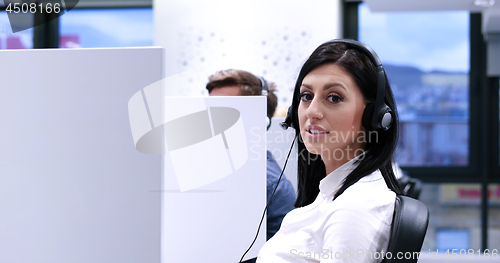 Image of female call centre operator doing her job