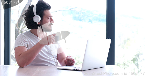 Image of man drinking coffee enjoying relaxing lifestyle