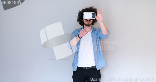 Image of Man using headset of virtual reality