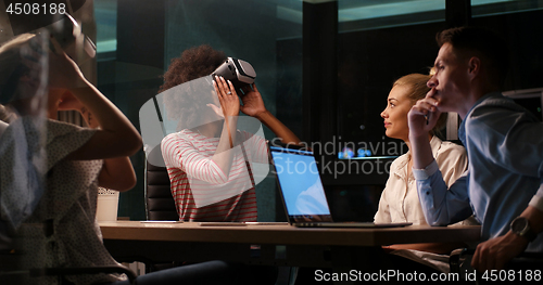 Image of Multiethnic Business team using virtual reality headset