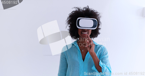 Image of black girl using VR headset glasses of virtual reality