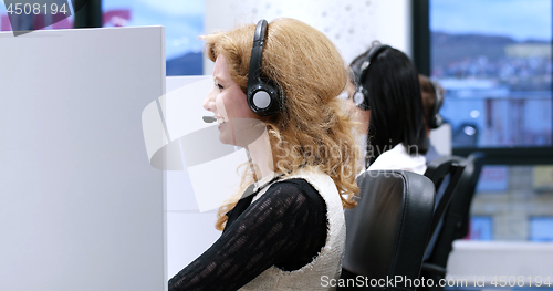 Image of female call centre operator doing her job