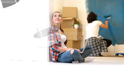 Image of Happy couple doing home renovations