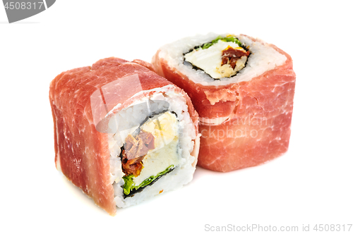 Image of Uramaki maki sushi with procsiutto, two rolls isolated on white