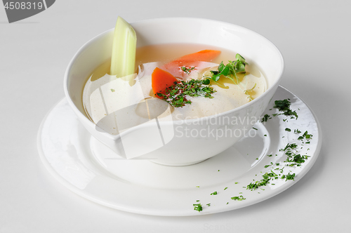 Image of Soup with turkey meatballs, potatoes and vegetables. selective focus