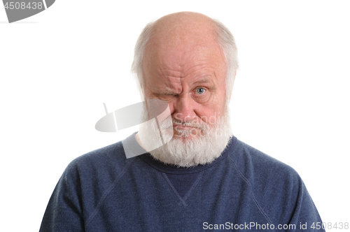 Image of dissatisfied displeased old grumpy man isolated portrait