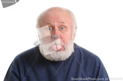 Image of senior man with sticking tongue out, isolated portrait