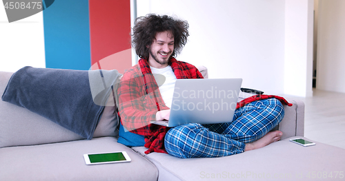 Image of man drinking coffee enjoying relaxing lifestyle
