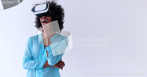 Image of black girl using VR headset glasses of virtual reality