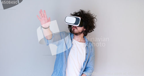 Image of Man using headset of virtual reality