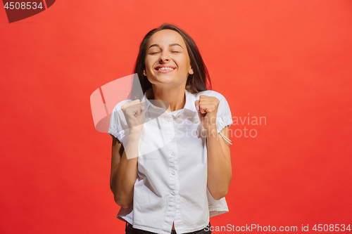 Image of Winning success woman happy ecstatic celebrating being a winner. Dynamic energetic image of female model