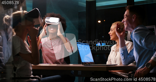 Image of Multiethnic Business team using virtual reality headset