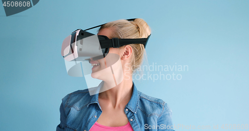 Image of woman using VR headset glasses of virtual reality