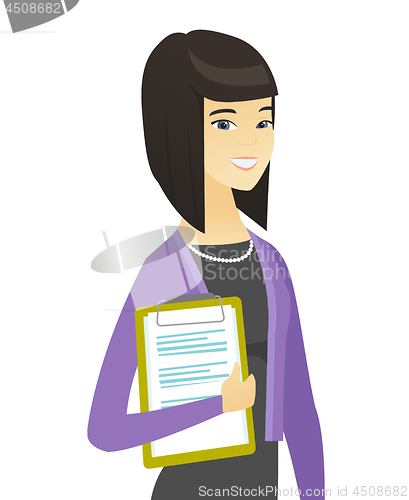 Image of Business woman holding clipboard with documents.