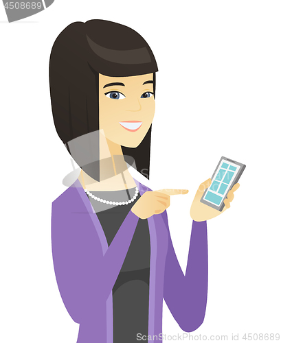 Image of Asian business woman holding mobile phone.