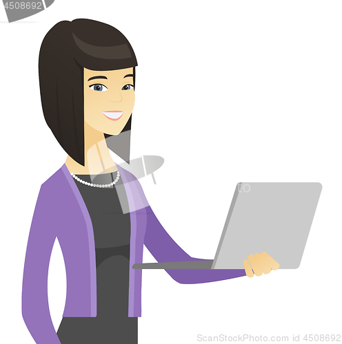 Image of Asian business woman using laptop.