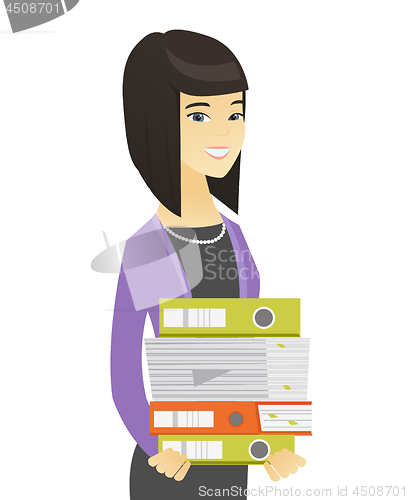 Image of Asian business woman holding pile of folders.