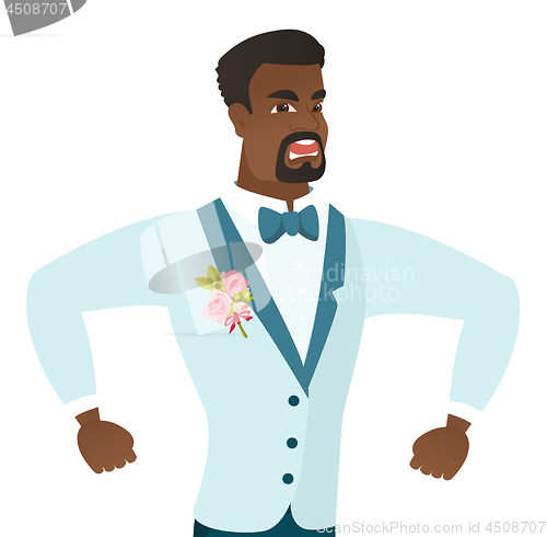 Image of Young african-american angry groom screaming.