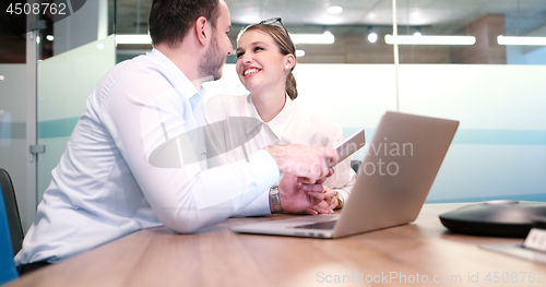 Image of Business People Working With laptop in office