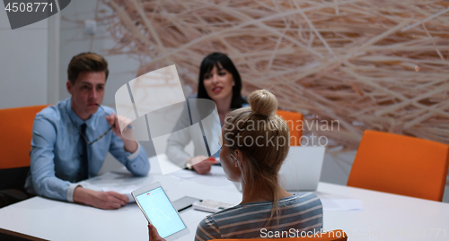 Image of Business Team At A Meeting at modern office building
