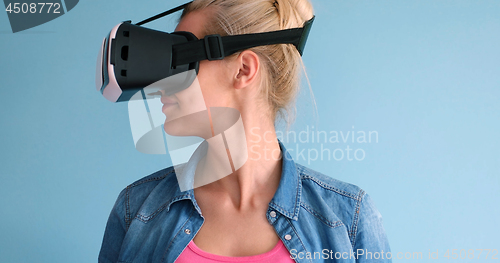 Image of woman using VR headset glasses of virtual reality