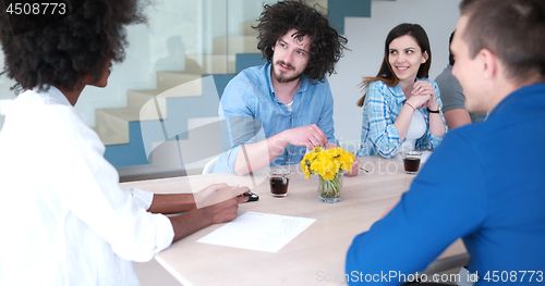 Image of Multiethnic startup business team on meeting