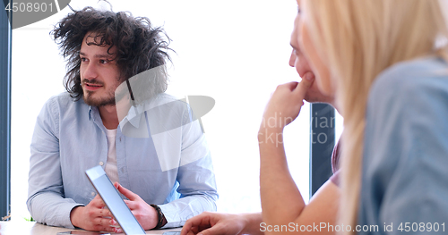 Image of Startup Business Team At A Meeting at modern office building