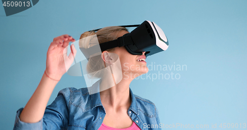 Image of woman using VR headset glasses of virtual reality