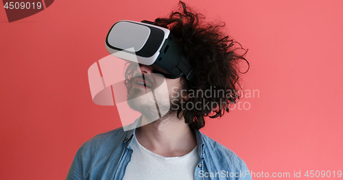 Image of young man using VR headset glasses of virtual reality