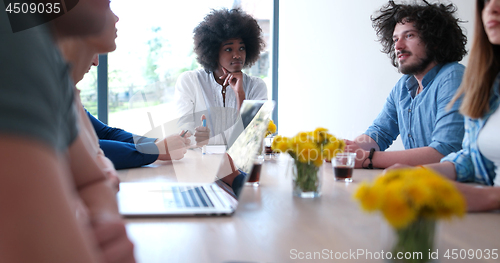 Image of Multiethnic startup business team on meeting