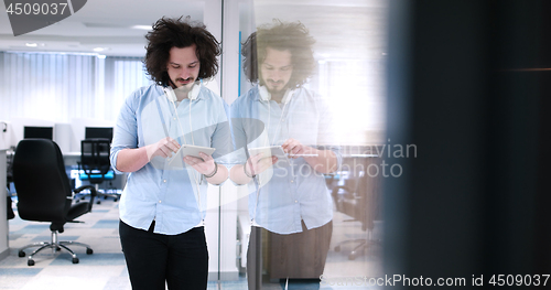 Image of businessman using tablet computer