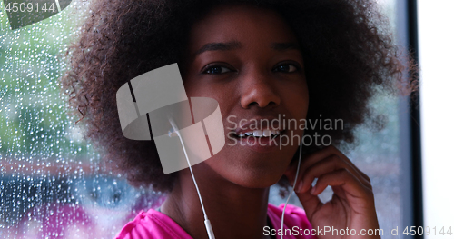 Image of portrait of young afro american woman in gym