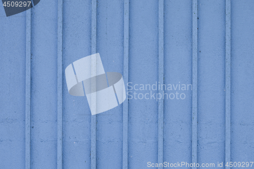 Image of Wooden blue painted striped plank wall.