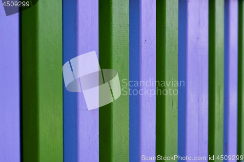 Image of Colorful blue and green wooden striped plank wall.