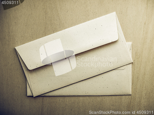 Image of Vintage looking Letter envelope on wood table