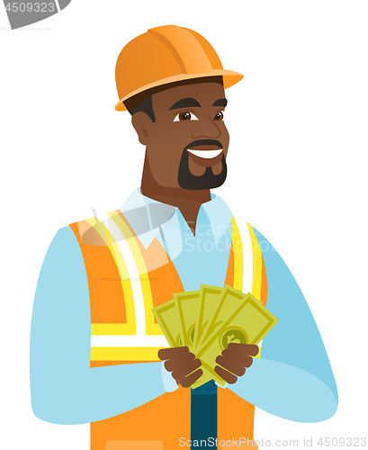 Image of Young african-american builder holding money.
