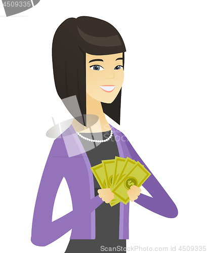 Image of Happy asian business woman holding money.