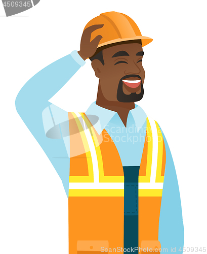 Image of Young african-american builder laughing.