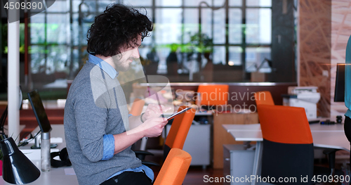 Image of businessman using tablet computer