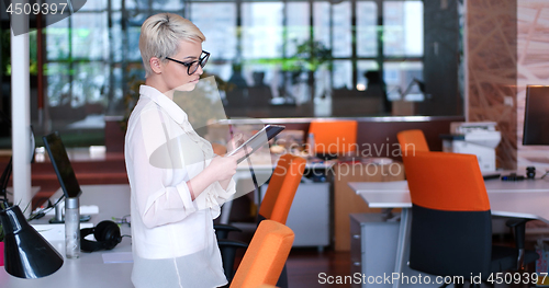 Image of Businesswoman using tablet