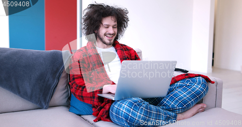 Image of man drinking coffee enjoying relaxing lifestyle